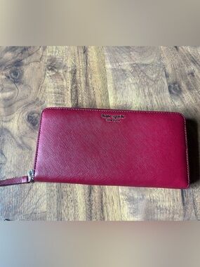 kate spade red zip-around saffiano leather wallet